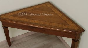 Classic triangular coffee table made of solid walnut with inlaid olive wood top